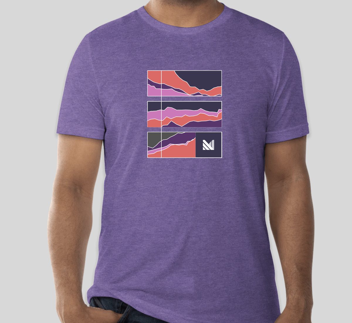 A purple Materialize t-shirt printed with the brand's layered wave graphic.