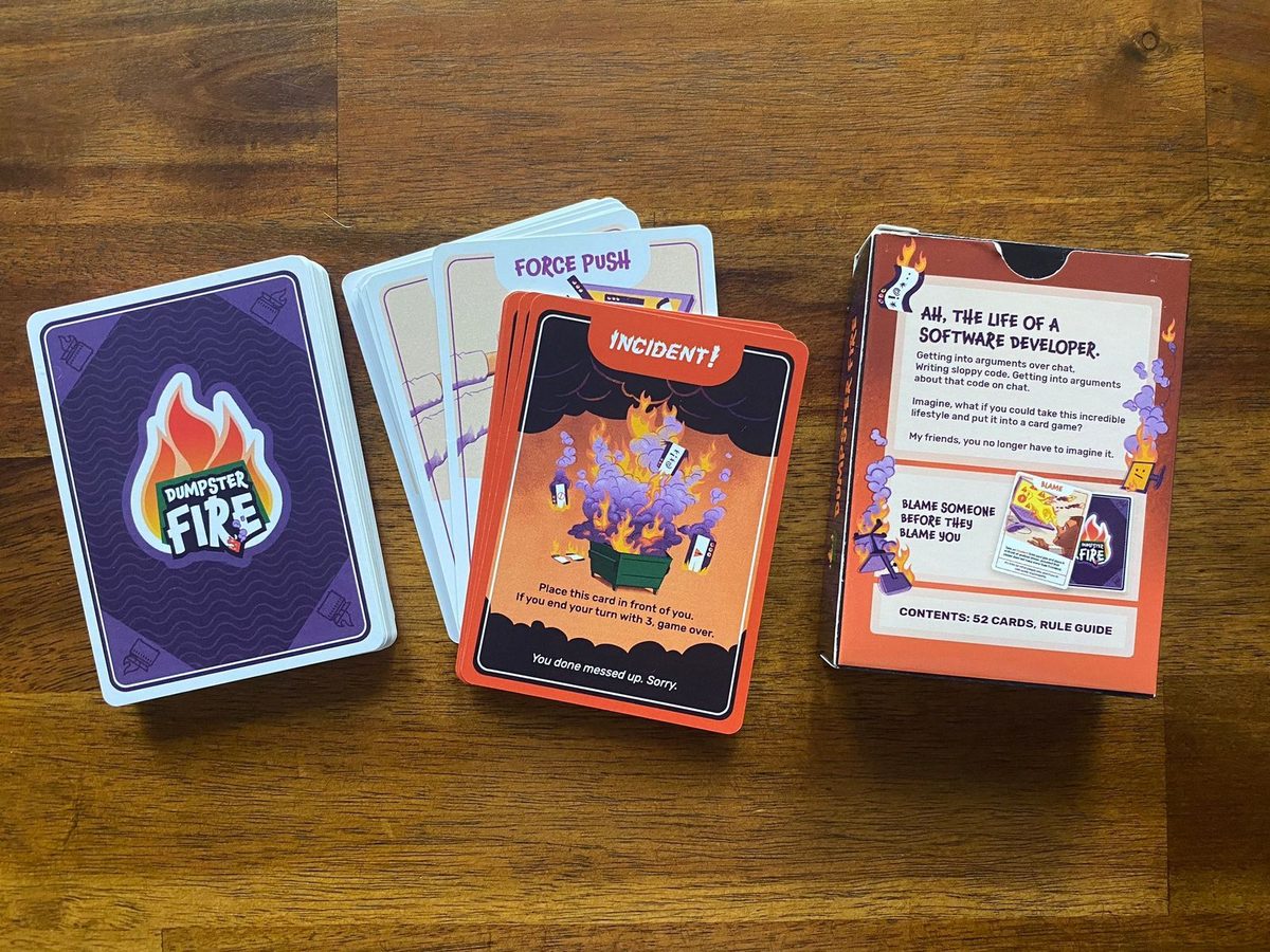 Illustrated Sentry card-game cards spread on a wooden table.